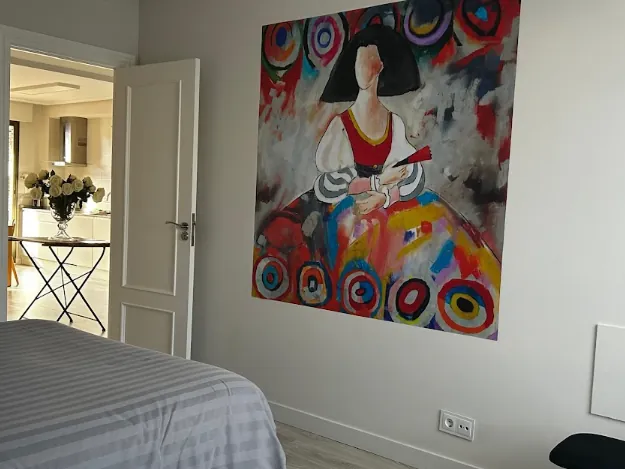Colourful painting in the bedroom